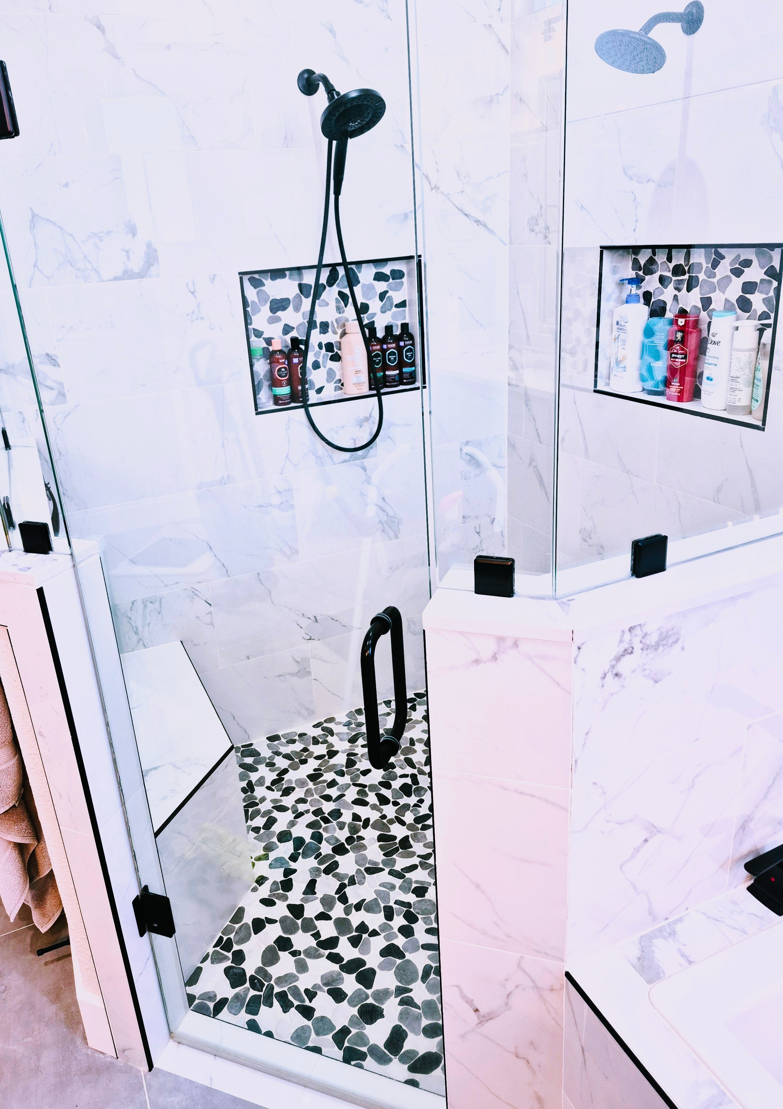 Pristine marble shower walls after professional deep cleaning