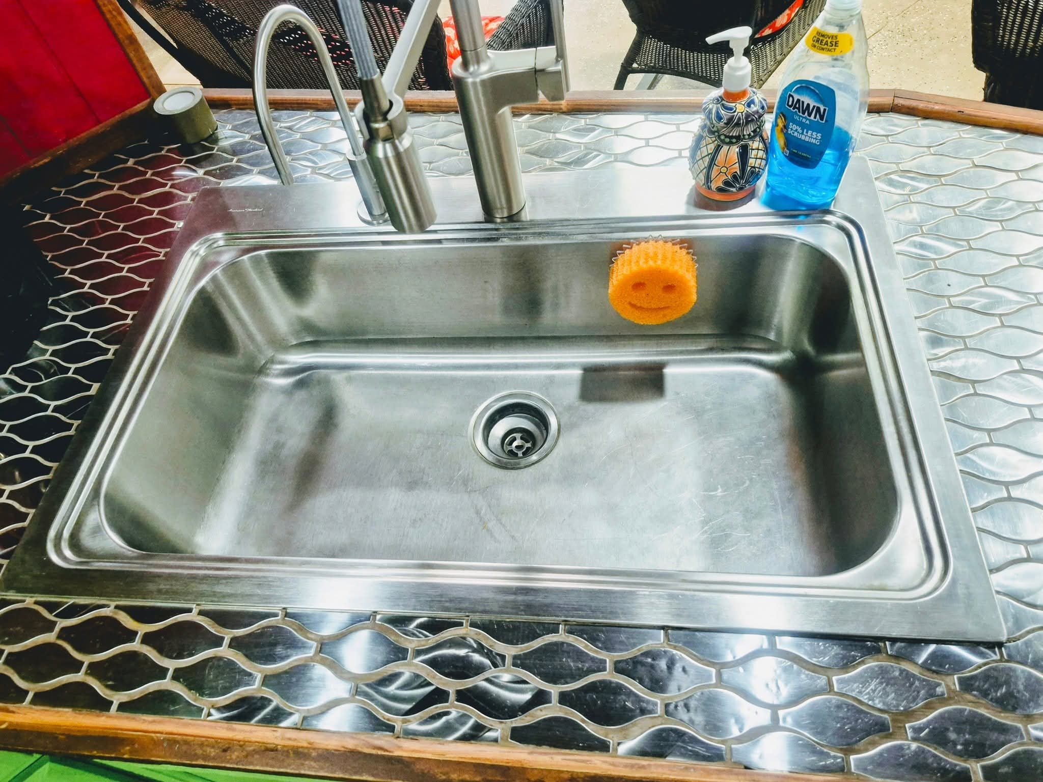 Sparkling clean outdoor sink after professional cleaning